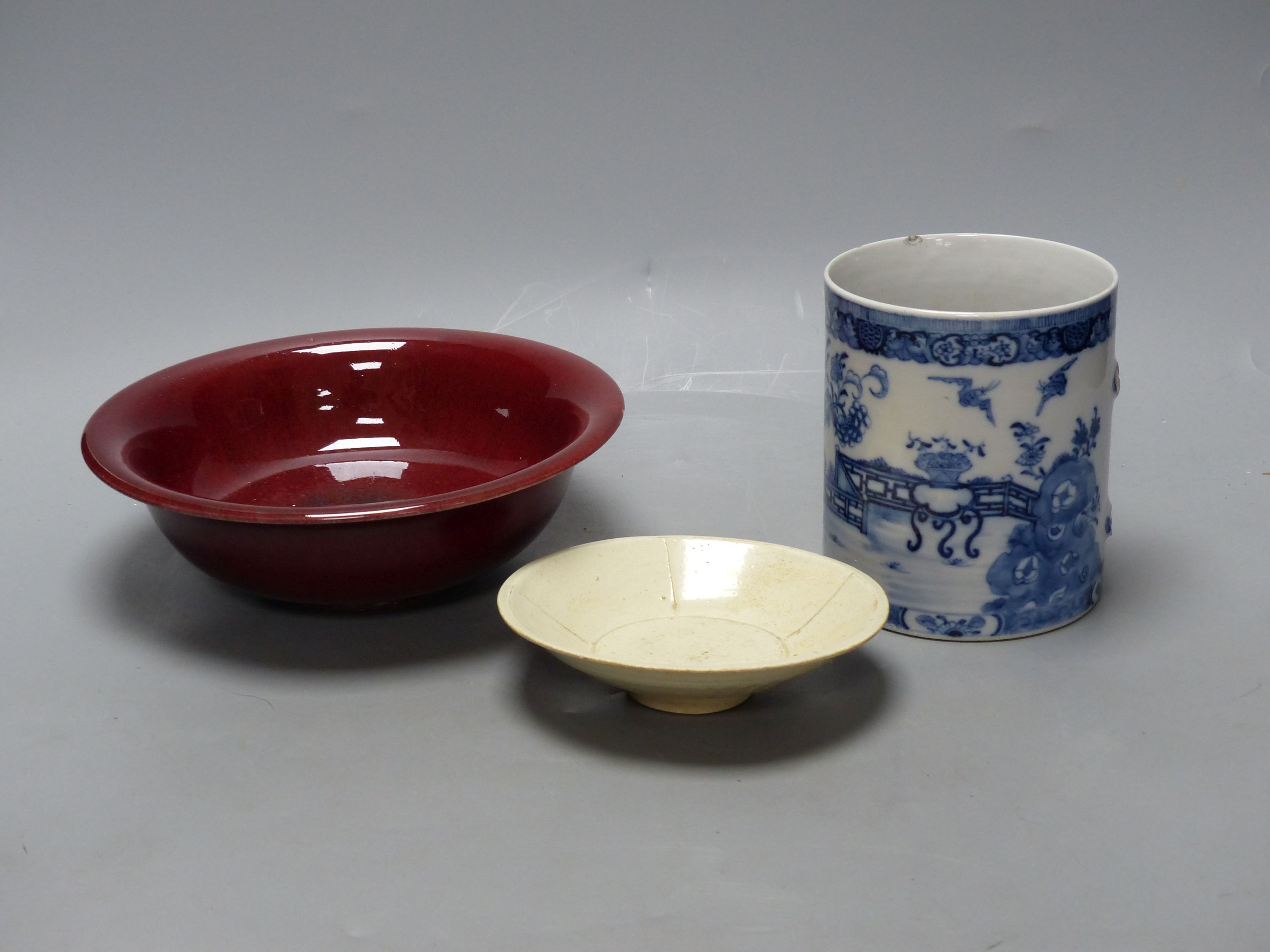 A Chinese blue and white mug, height 13cm, a bowl and a dish